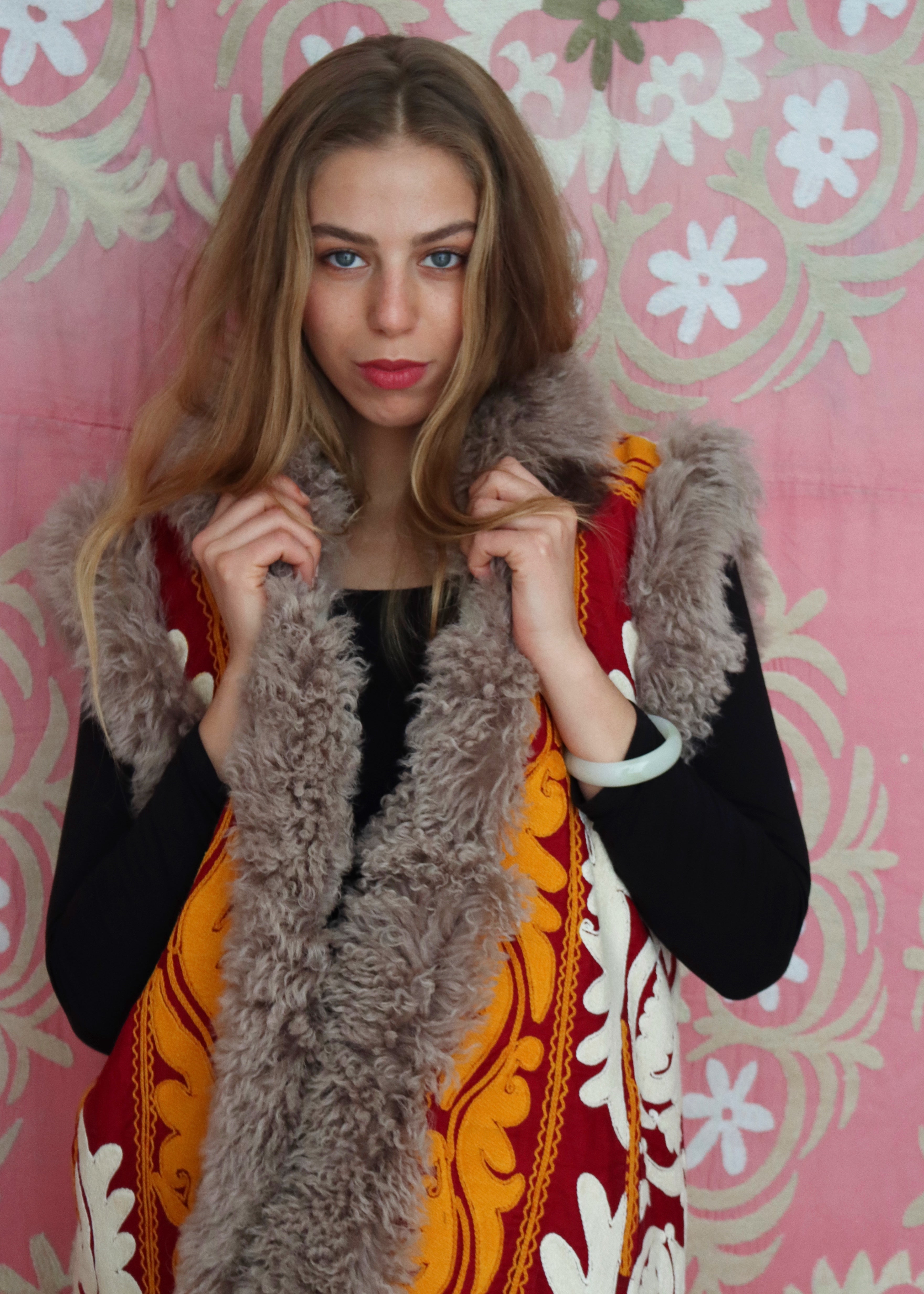 artisan made white orange and red coat with white embroidery