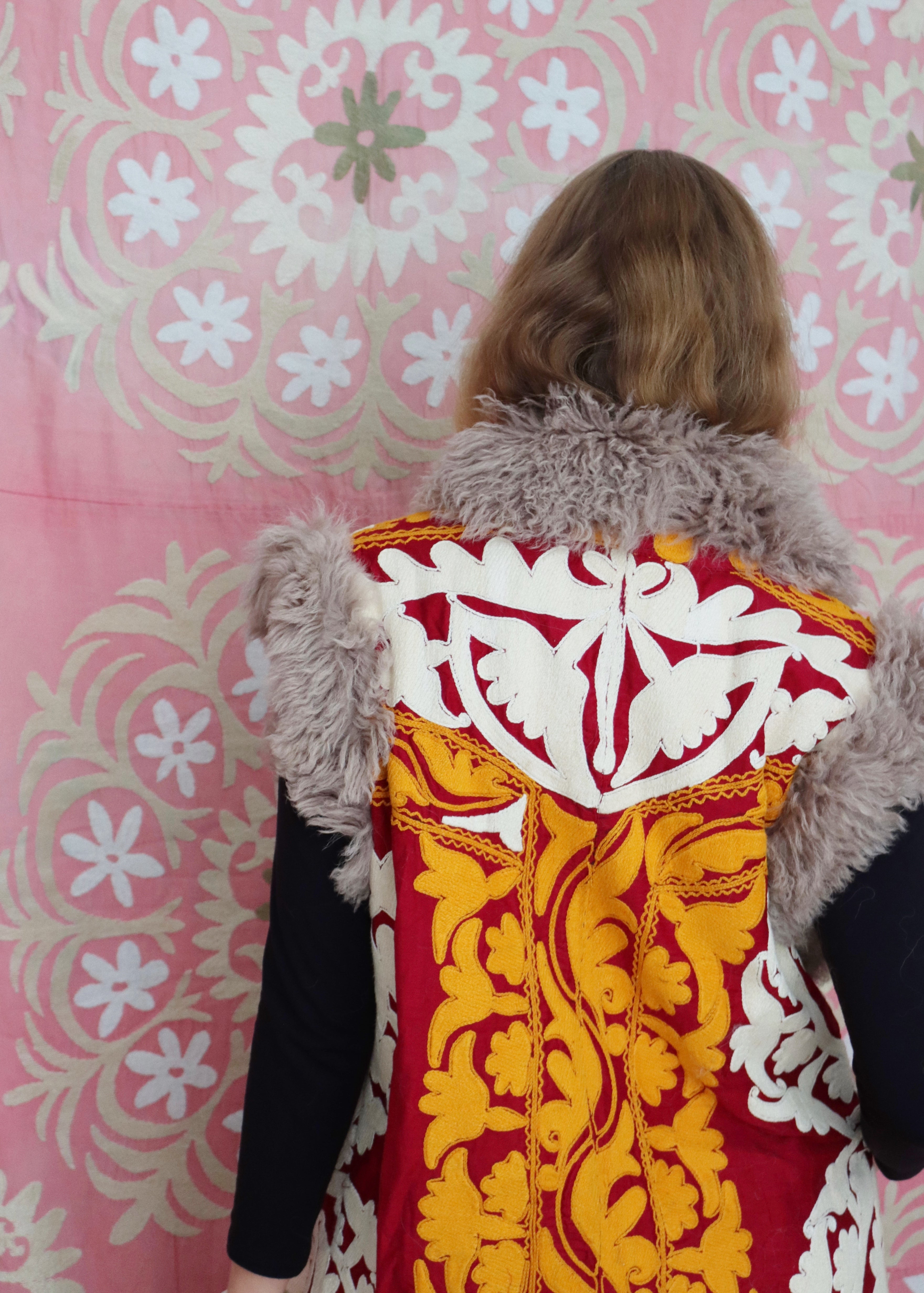 Fully-lined suzani vest with up-cycled Mongolian sheep rugs