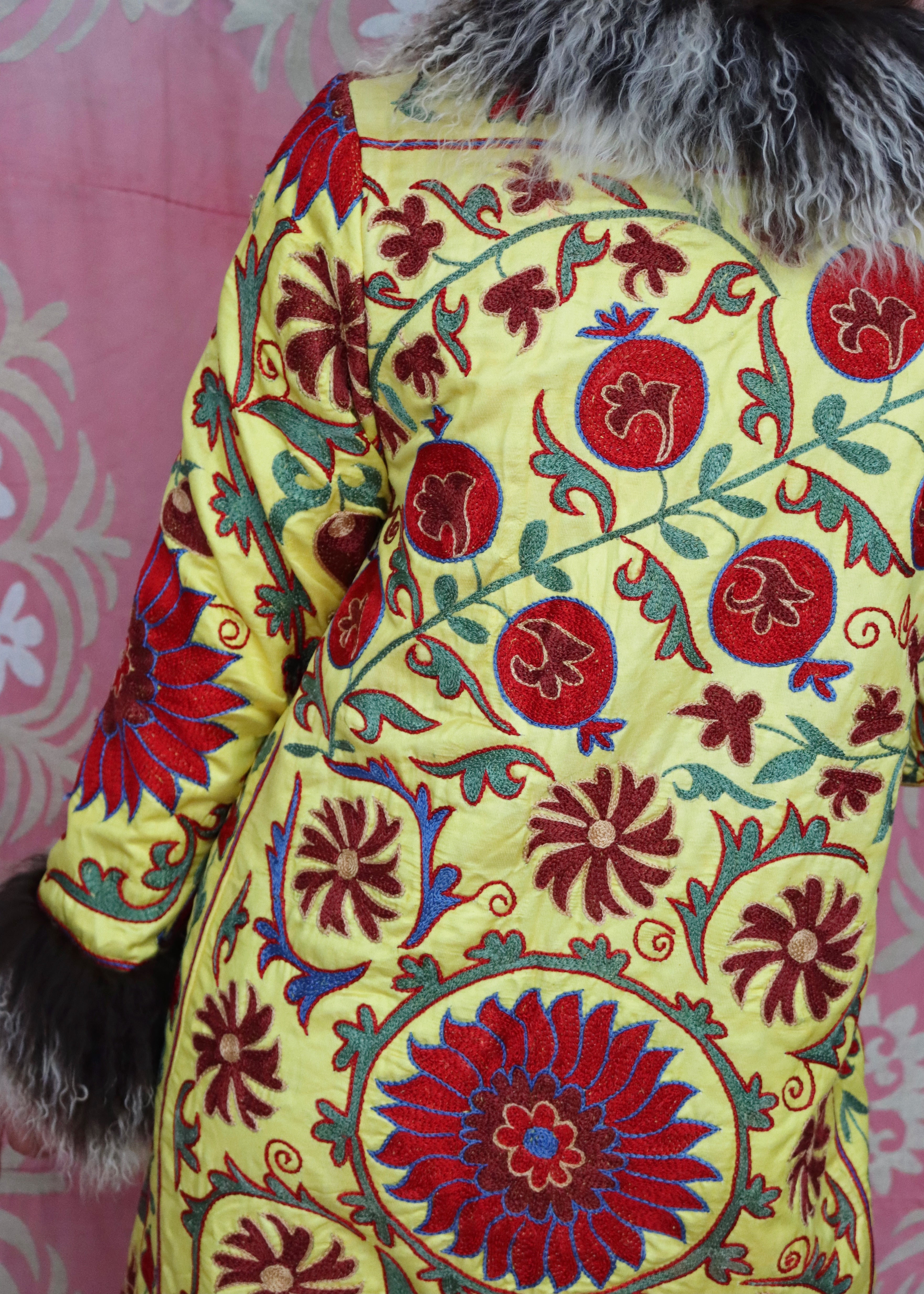 Fully-lined suzani vest with up-cycled Mongolian sheep rugs