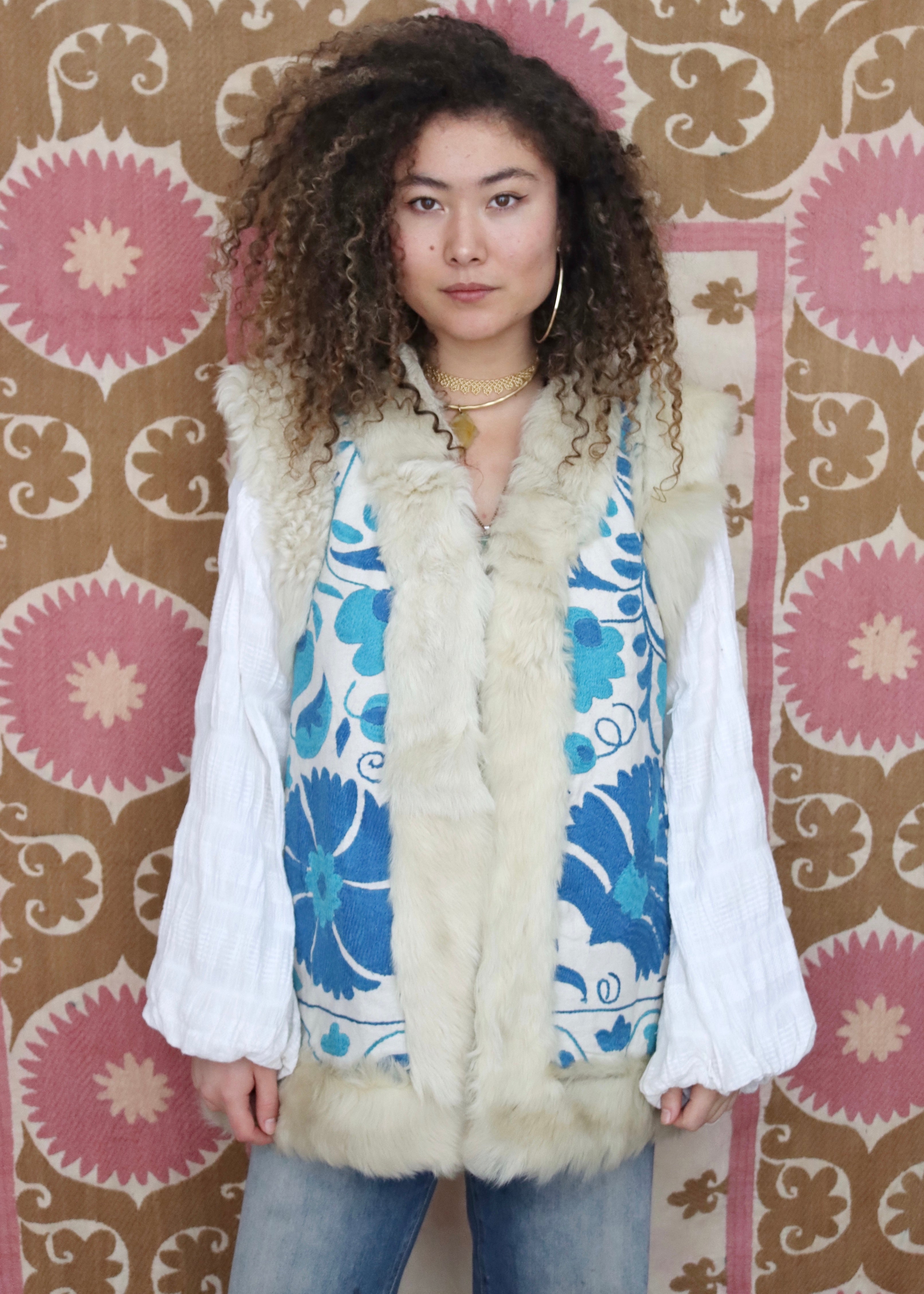 artisan made white suzani vest with blue embroidery