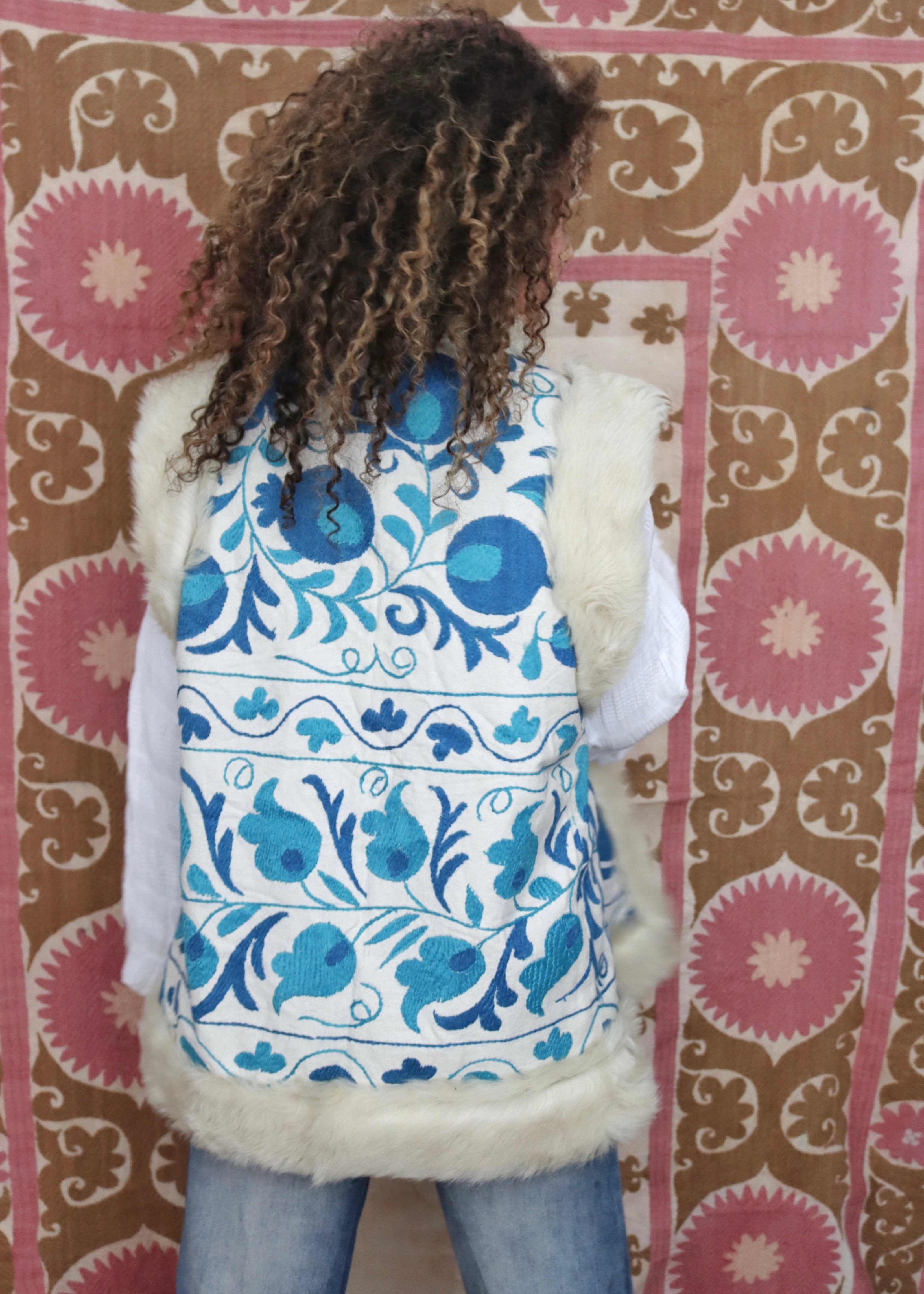 white and blue hippie vest